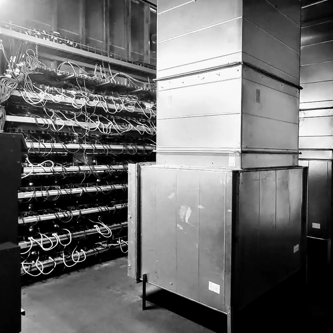 Intake air duct beside racked miners